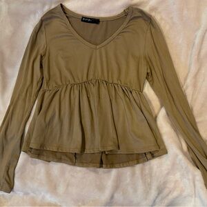 long sleeve brown shirt thats a little cropped and soft material